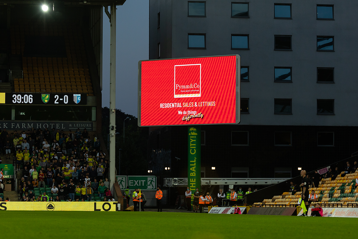 Regional Club Partners Pymm & Co on the big screen at Carrow Road home of Norwich City Football Club